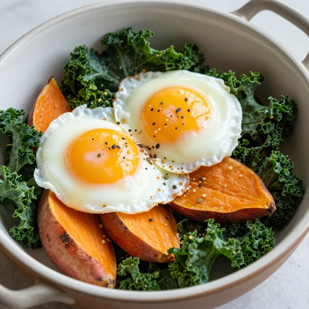 warm breakfast casserole with sweet potatoes kale and poached eggs