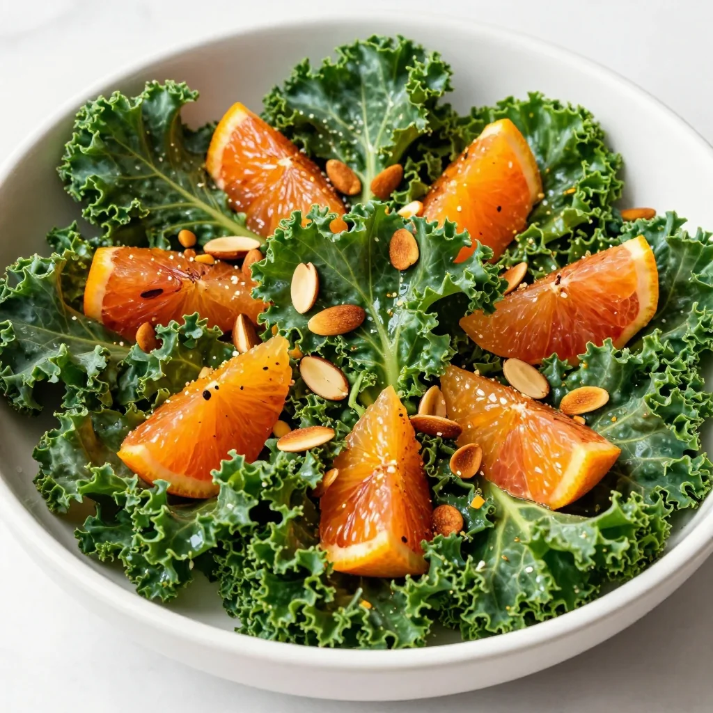 warm citrus and kale salad with toasted almonds for clean eating