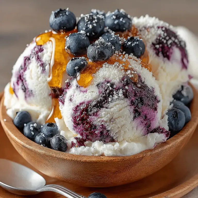 There's something truly delightful about homemade ice cream. The process of creating a frozen treat from scratch not only fills your kitchen with a rich, sweet aroma but also brings a sense of accomplishment. Whether it's a hot summer day or a cozy winter evening, a scoop of creamy ice cream can elevate any moment. For those who love the taste of fresh fruit and the satisfaction of a homemade dessert, this Berrylicious No-Churn Blueberry Ice Cream is a must-try.